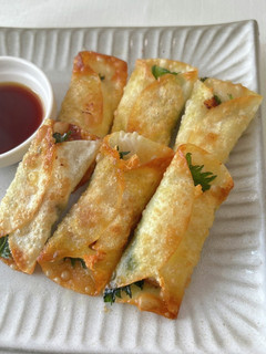 A picture of Crispy Gyoza with Ume, Chicken, Shiso, and Cheese.