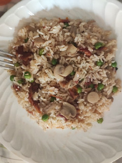 Una foto de Arroz con tomates secos y champiñones