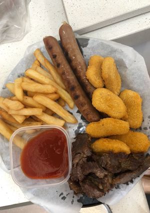 A picture of Suya, fries, hotdog and fish fillet.