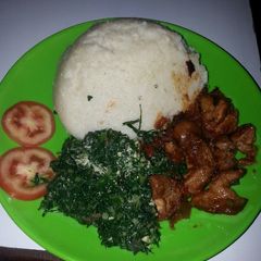 A picture of Wet Fried pork with kienyeji.