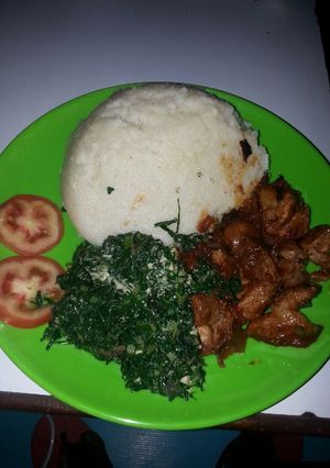 A picture of Wet Fried pork with kienyeji.