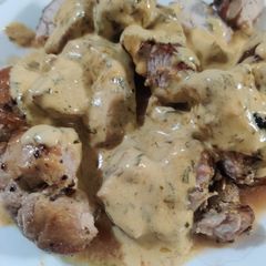 A picture of Pork Tenderloin with Mustard Cream Sauce.