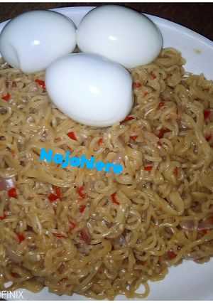 A picture of Noodles with boiled eggs.
