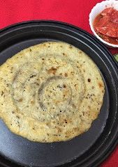 A picture of Yellow moong dal cheela.