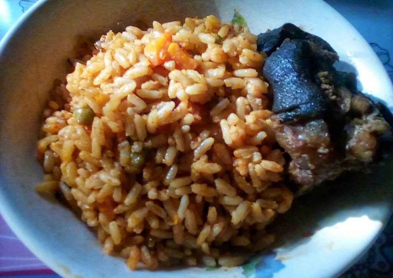 Coconut Jollof Rice and Fried Chevon