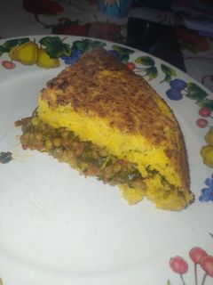Una foto de Pastelón de choclo relleno con lentejas 🌽