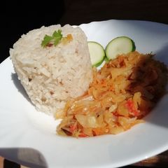 A picture of Fried cabbage with fried rice.