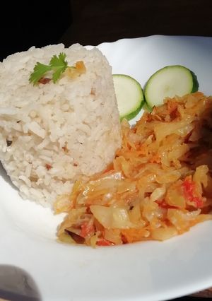 A picture of Fried cabbage with fried rice.