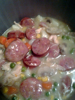 A picture of chicken and sausage stew.