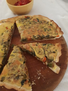Una foto de Tarta de zapallitos con masa casera