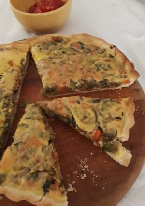 Una foto de Tarta de zapallitos con masa casera