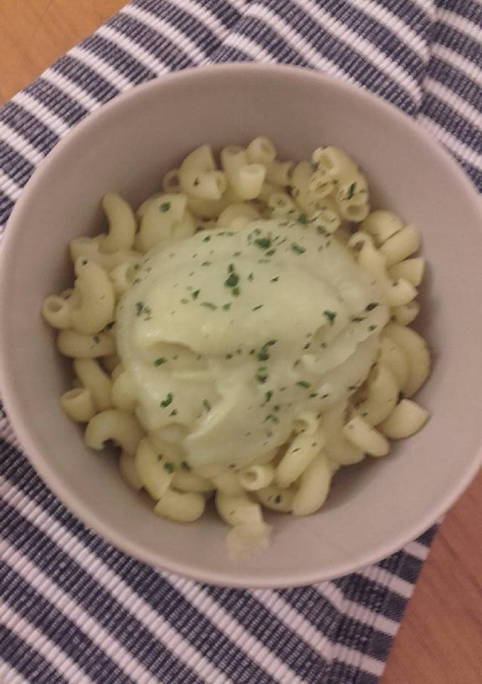 Una foto de Caracolas con salsa de coliflor y queso