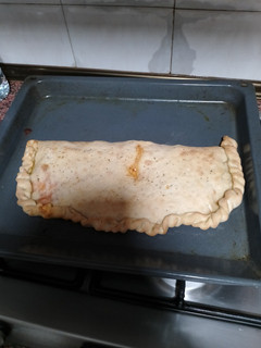 Una foto de Calzone de Jamón y Queso