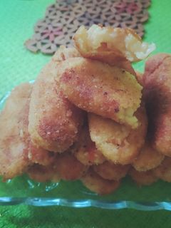 صورة لوصفة كروكات الأرز المحشية بالجبن 🧀