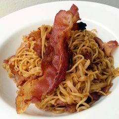 A picture of Fried Spicy Noodle With Crispy Bacon.
