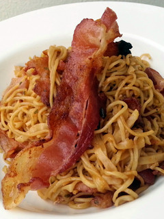 A picture of Fried Spicy Noodle With Crispy Bacon.