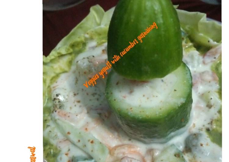 Veggies yogurt with cucumber garnishing
