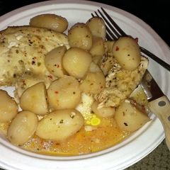 A picture of Italian chicken and potatoes.