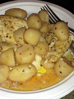A picture of Italian chicken and potatoes.