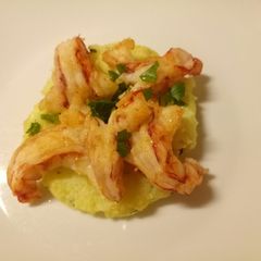 A picture of Prawns and mash.