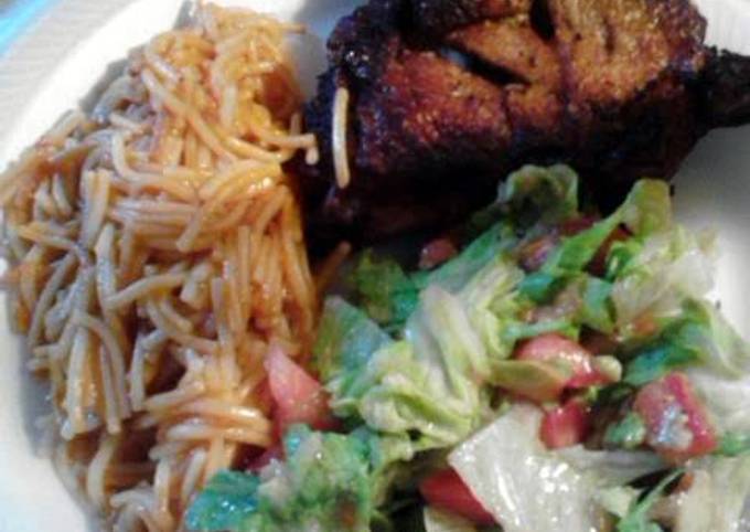 fried chicken with fideo and salad