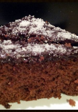 A picture of AMIEs CHOCOLATE Coconut Cake.