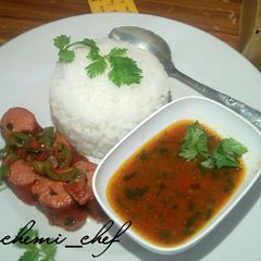 A picture of White rice with sausage soup.