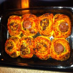 A picture of Chicken Stuffed Pizza Biscuits.