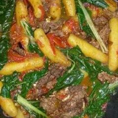 A picture of Matoke with beef.