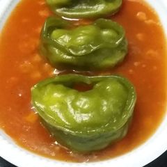 A picture of Spinch momos with knorr tomato soup.