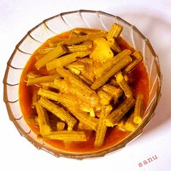 A picture of Drumstick Potato Curry.