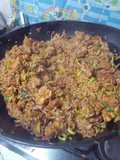 Arroz chaufa con pollo, pernil de cerdo y chorizos