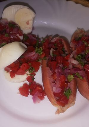 A picture of Eggs, smokies with kachumbari.