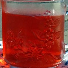A picture of OLD FASHIONED SUN TEA WITH DEBBIE'S STRAWBERRY SYRUP.