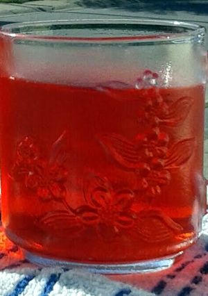 A picture of OLD FASHIONED SUN TEA WITH DEBBIE'S STRAWBERRY SYRUP.