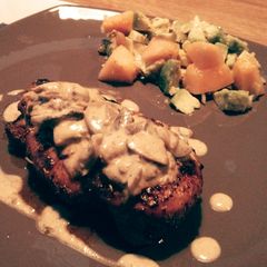 A picture of Roasted Chicken Breast with Mushroom Wine Reduction Sauce.