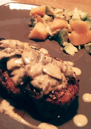 A picture of Roasted Chicken Breast with Mushroom Wine Reduction Sauce.