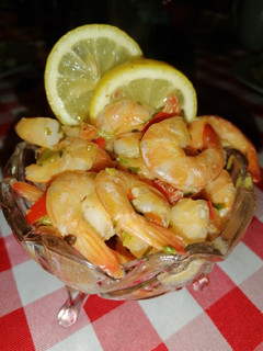 Una foto de Camarones al pil pil
