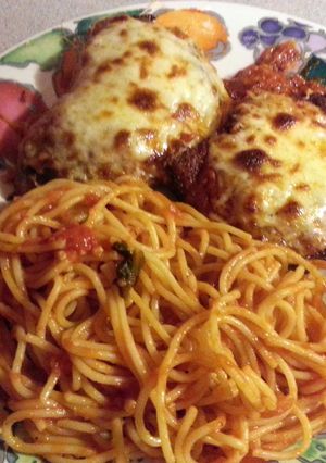 A picture of Chicken Parmesan with Homemade Red Sauce.