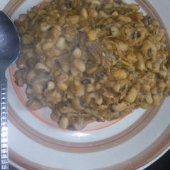 A picture of Porridge beans and dried fish.