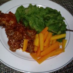 A picture of Mushed potatoes and Stew.
