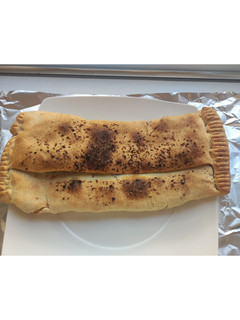 Una foto de Empanada de atún, calabacín y queso 🧀
