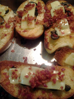 A picture of fried bread with toppings.