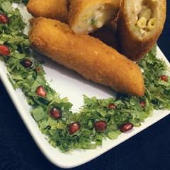 A picture of Cheesy Pasta breadrolls.