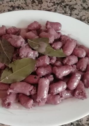 Una foto de Salchichas al vino tinto
