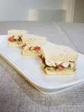 Tramezzini con mazzancolle e carciofi