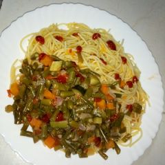 A picture of Carrot spaghetti and French beans.