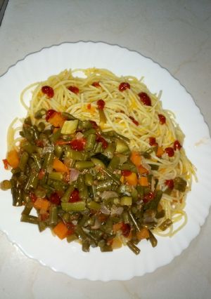 A picture of Carrot spaghetti and French beans.