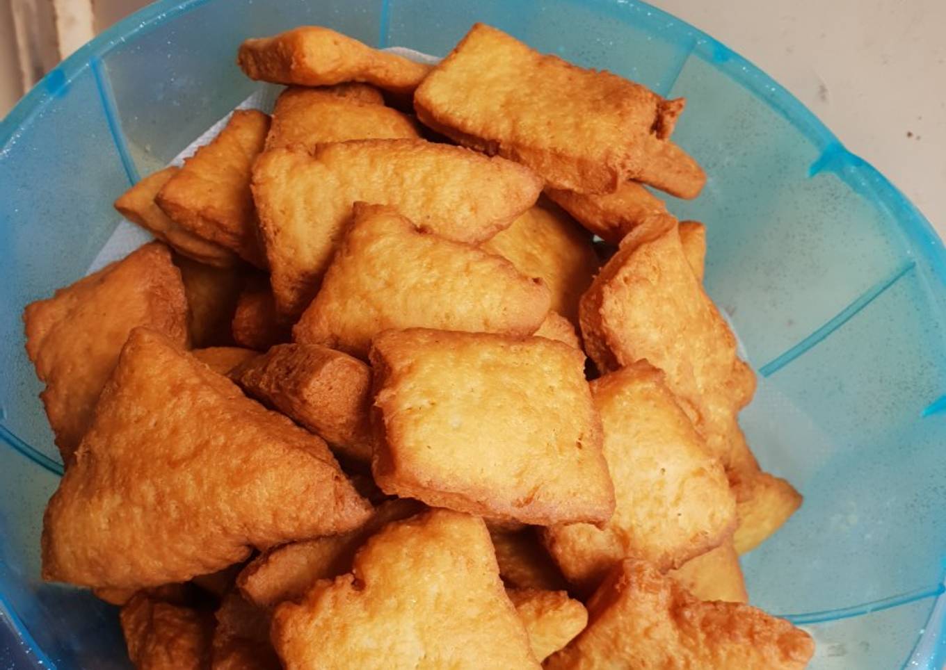 Crunchy soft Mandazi with cinammon and orange rind