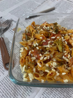 A picture of Broccoli Pasta in Red Sauce.
